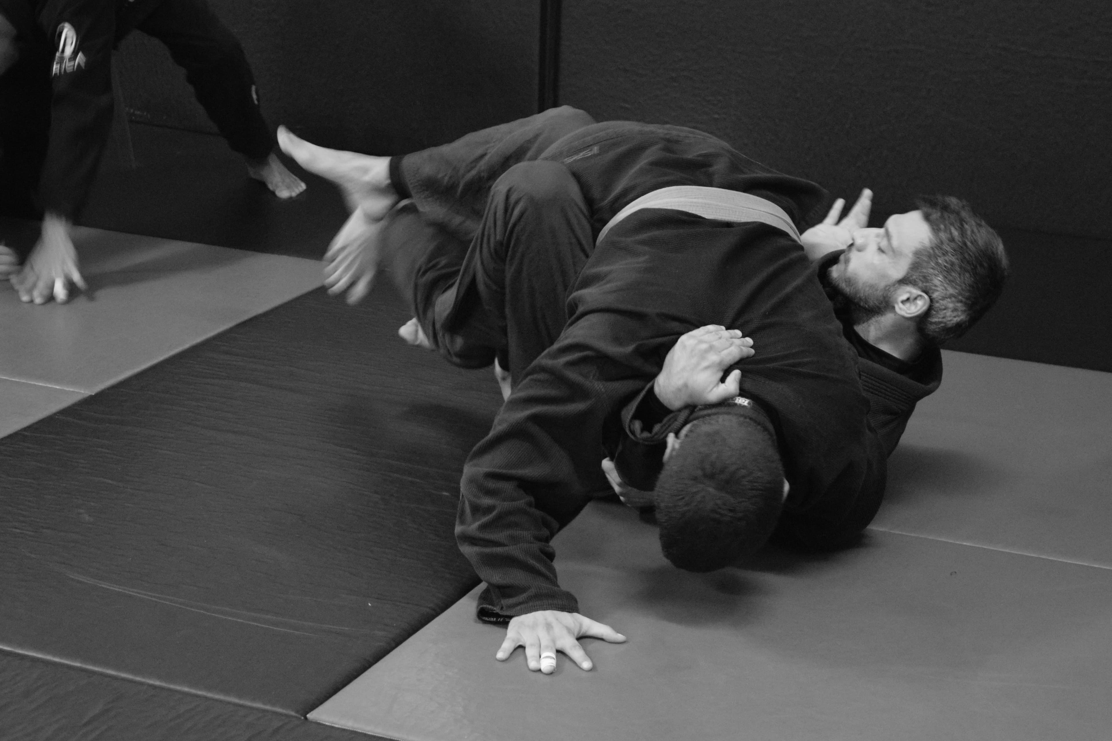 Female BJJ practitioner demonstrating a self-defense technique at our BJJ academy in Cyprus.