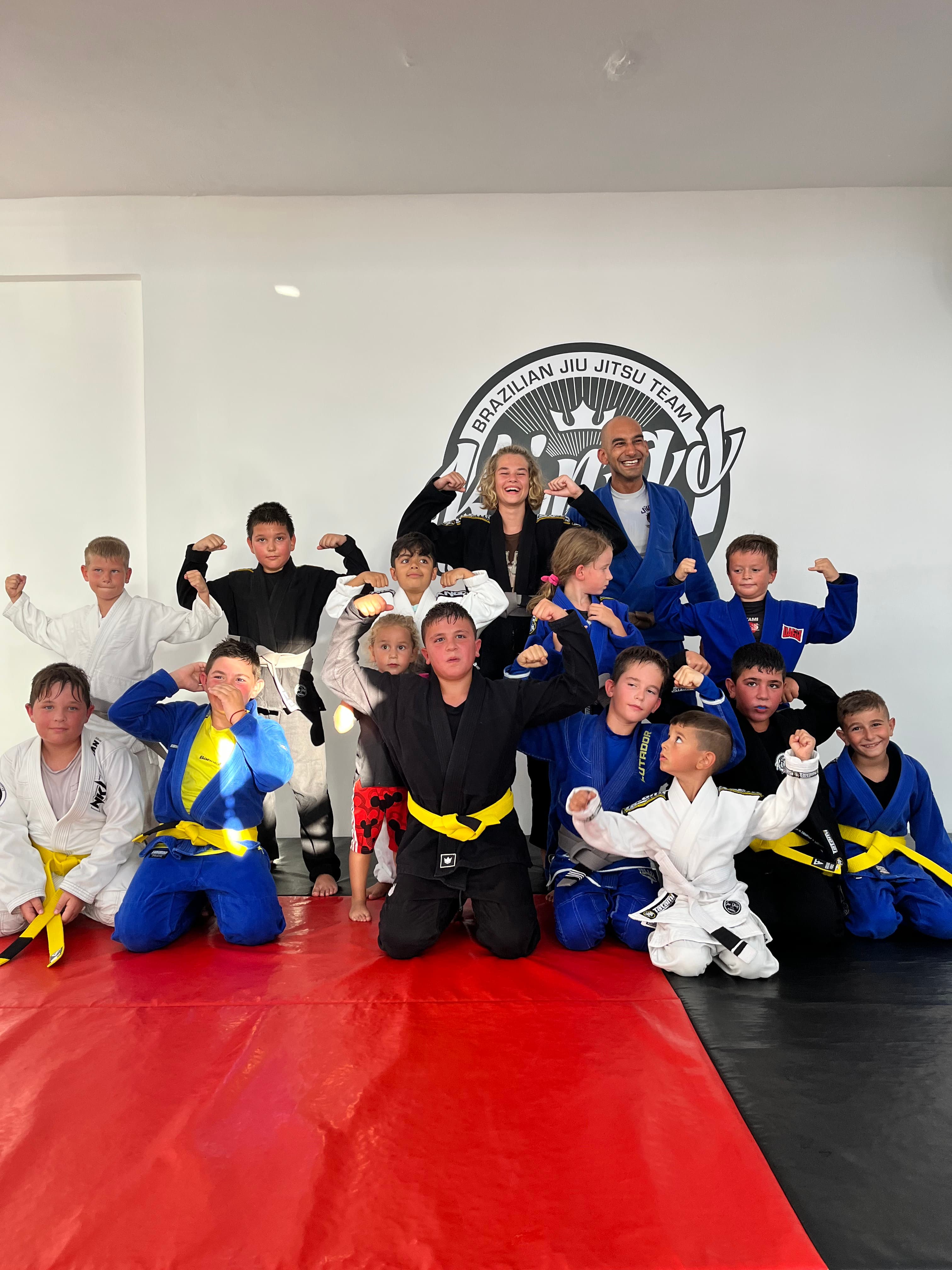 Our little champions from the BJJ gym in Paphos, Cyprus, standing proudly as a team, symbolizing the spirit of youth empowerment in BJJ.