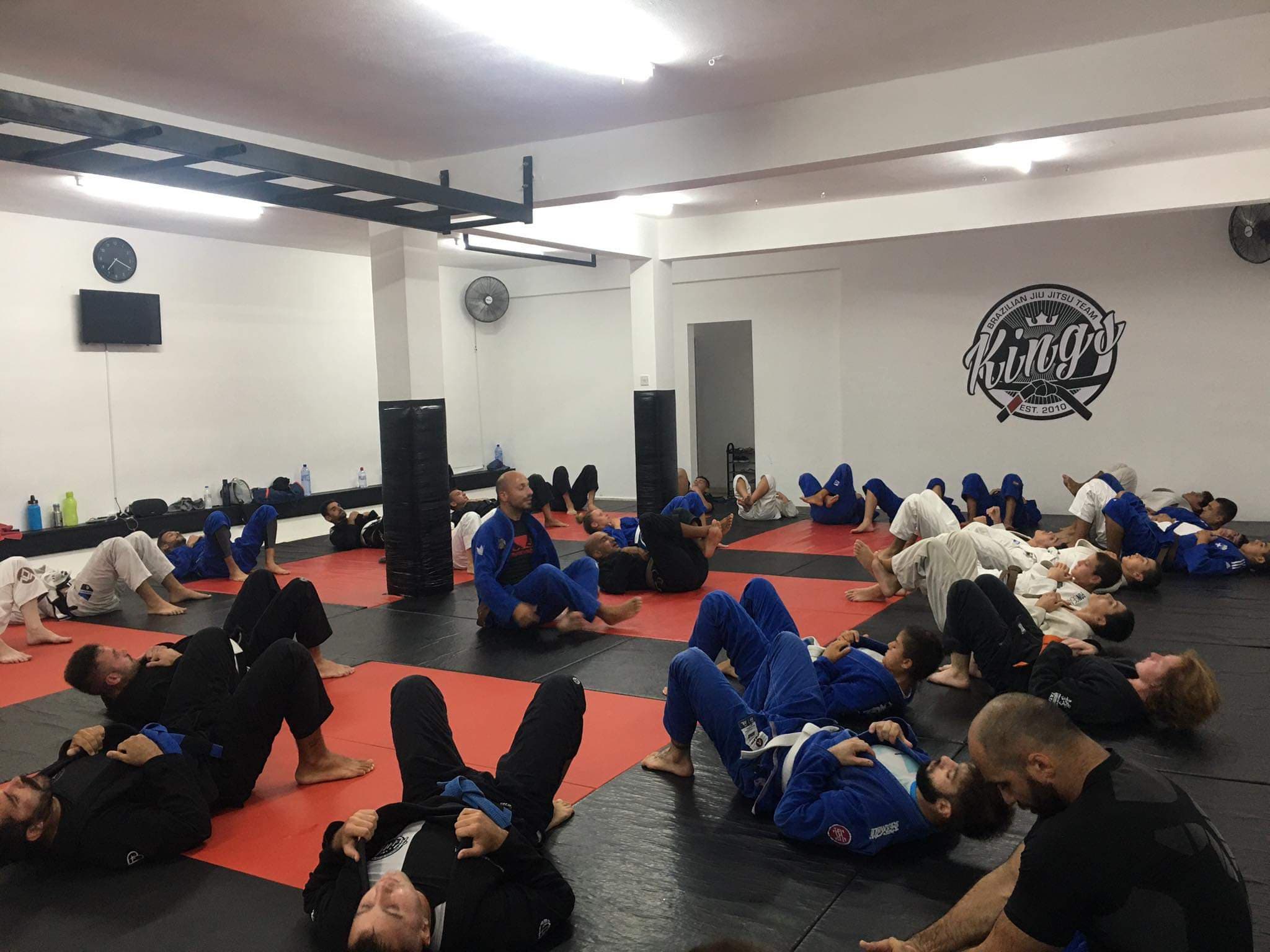 Strength in numbers: our BJJ family at our gym in Paphos, Cyprus, standing strong and supportive, fostering a sense of community in BJJ Cyprus.