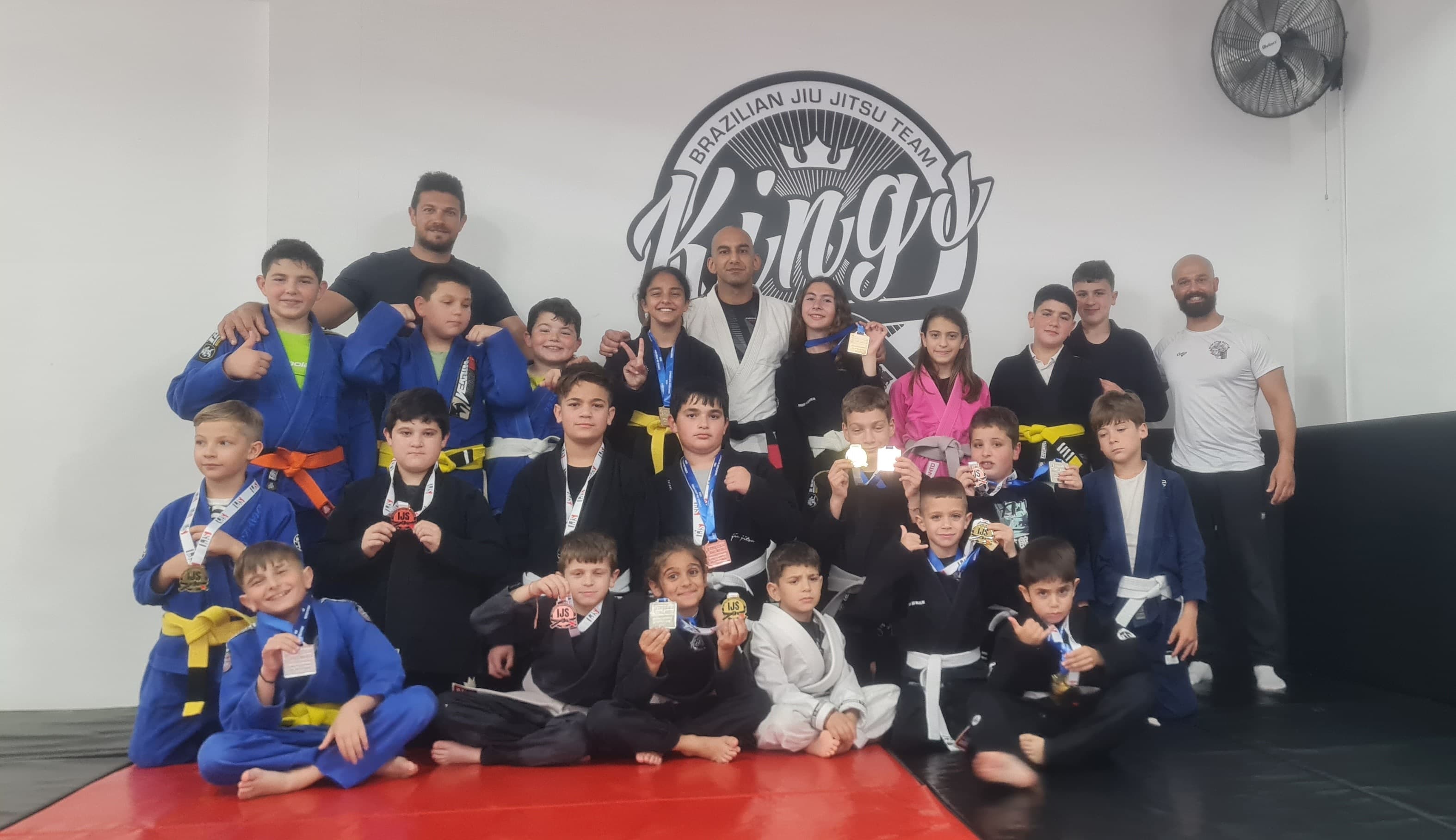 Our young BJJ enthusiasts, standing together as a team, showcasing the future of Brazilian Jiu Jitsu in Cyprus.