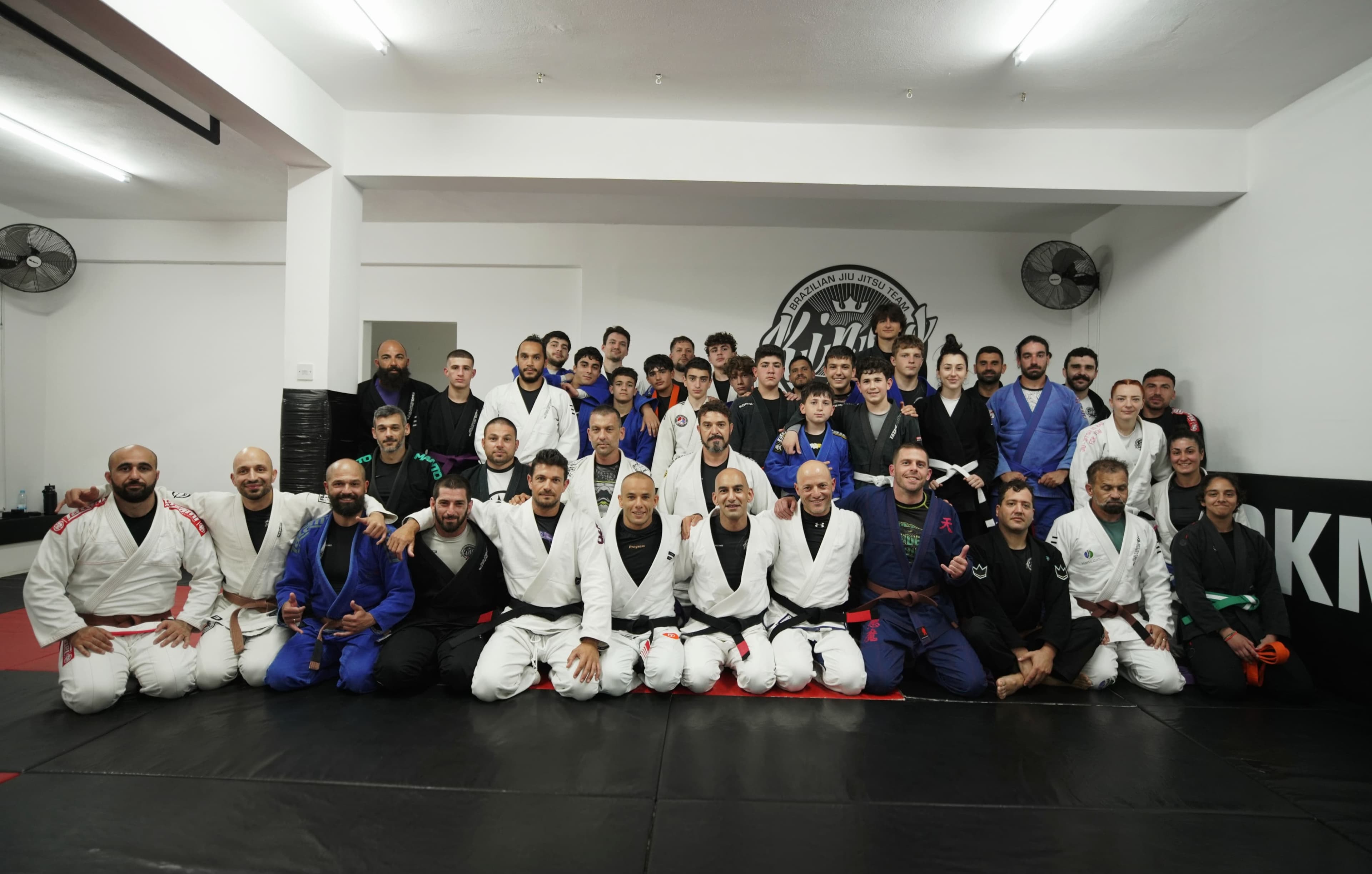 Our little champions from the BJJ gym in Paphos, Cyprus, standing proudly as a team, symbolizing the spirit of youth empowerment in BJJ. Our little champions from the BJJ gym in Paphos, Cyprus, standing proudly as a team, symbolizing the spirit of youth empowerment in BJJ.